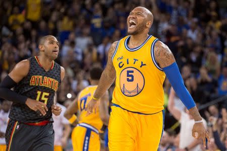 March 1, 2016; Oakland, CA, USA; Golden State Warriors center Marreese Speights (5) celebrates after making a three-point against the Atlanta Hawks during the fourth quarter at Oracle Arena. Mandatory Credit: Kyle Terada-USA TODAY Sports