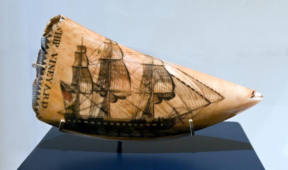 A carving of a ship called the Vineyard on part of a whale is one of 250 pieces in a major scrimshaw exhibit on display through October at the Cahoon Museum of American Art in Cotuit.