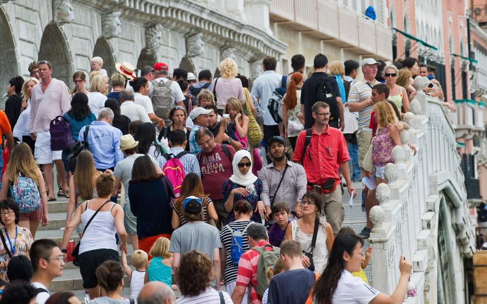 Currently, tourists crowd the city in high season.