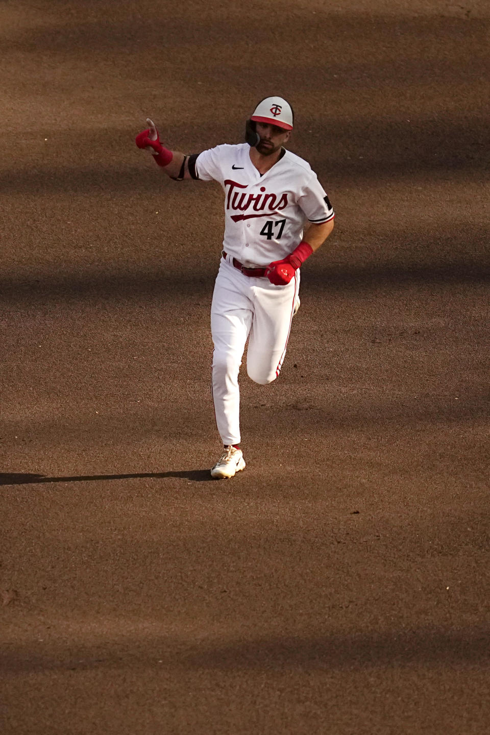 Minnesota Twins' Edouard Julien runs the bases after hitting a solo home run against the Kansas City Royals during the first inning of a baseball game Wednesday, July 5, 2023, in Minneapolis. (AP Photo/Abbie Parr)