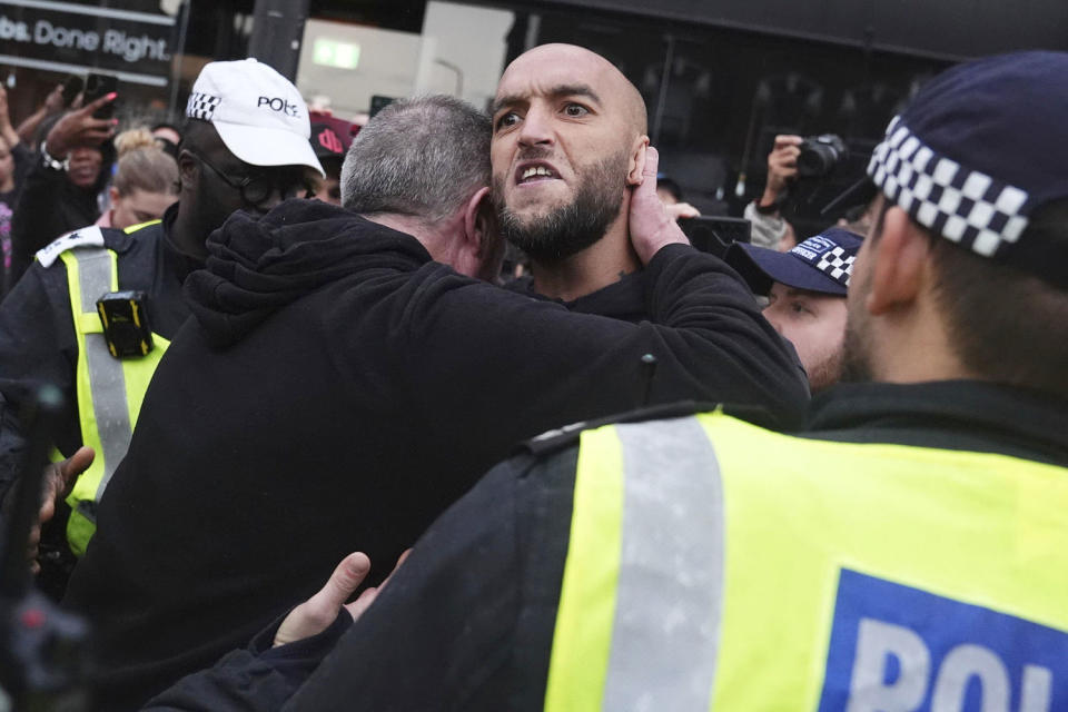 Anti-immigration protester in London (PA Images via AP)