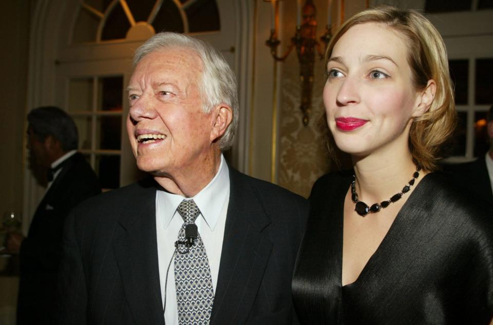 NEW YORK - NOVEMBER 7: Former U.S. President Jimmy Carter and his granddaughter Sarah E. Chuldenko attend the Aspen Institute Awards Dinner November 7, 2002 in New York City. (Photo by Mario Tama/Getty Images)