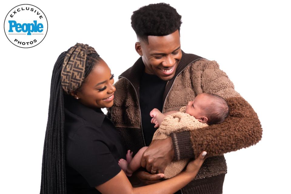 <p>Troy Woods / Clark Bailey Photography</p> Tim Bowman Jr. and wife Brelyn with their baby boy