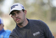 Patrick Cantlay follow his drive from the second tee of the Pebble Beach Golf Links during the third round of the AT&T Pebble Beach Pro-Am golf tournament in Pebble Beach, Calif., Saturday, Feb. 5, 2022. (AP Photo/Eric Risberg)