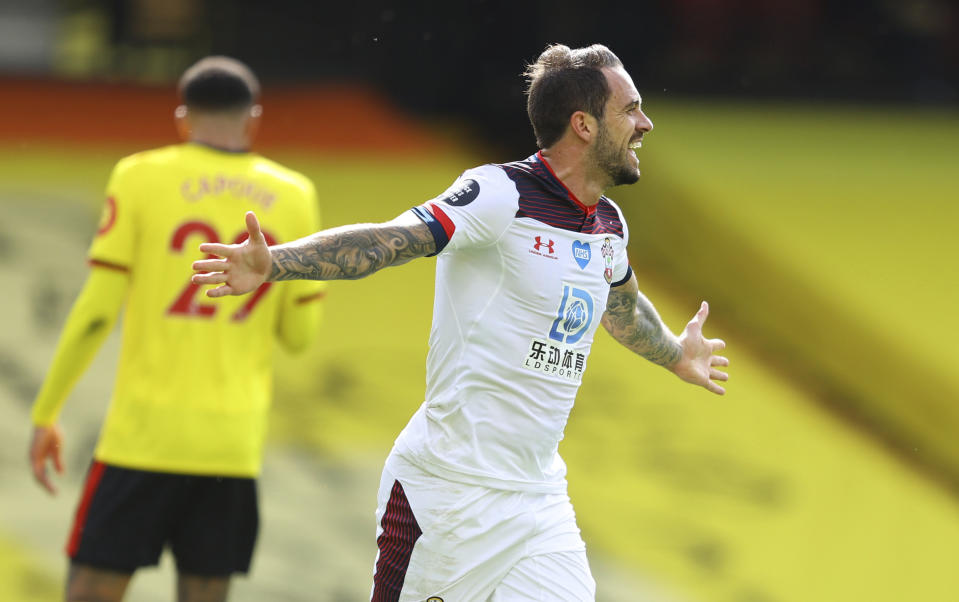 Southampton's Danny Ings celebrates after scoring the opening goal of the game during the English Premier League soccer match between Watford and Southampton at the Vicarage Road stadium in Watford England, Sunday, June 28, 2020. (Richard Heathcote/Pool via AP)