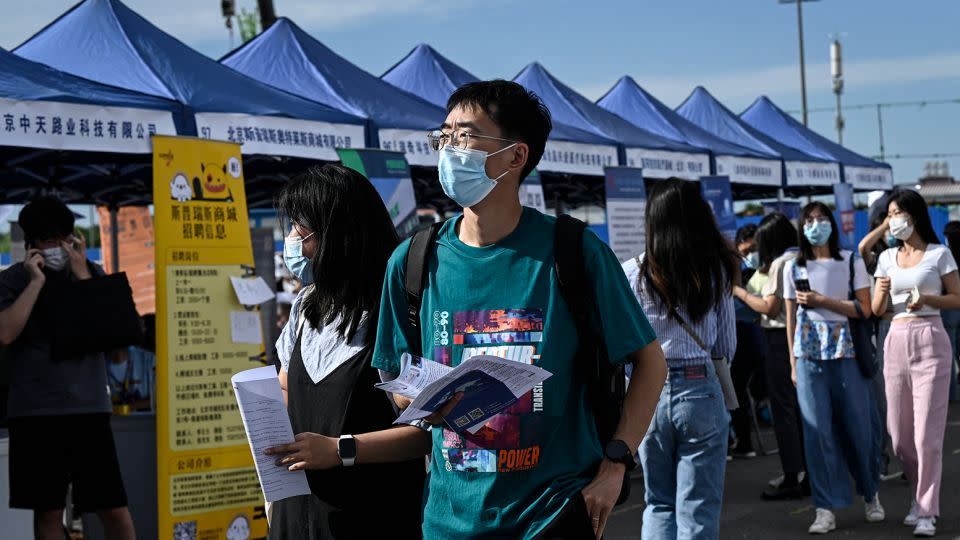 People attending a job fair in Beijing on August 26, 2022. - Jade Gao/AFP/Getty Images