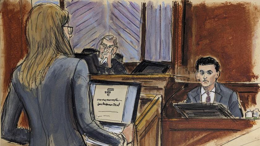 In this courtroom sketch, FTX founder Sam Bankman-Fried, right, is cross examined by Assistant US Attorney Danielle Sassoon, left, while Judge Lewis Kaplan listens, center, in Manhattan federal court, Monday, Oct. 30, 2023, in New York. (Elizabeth Williams via AP)
