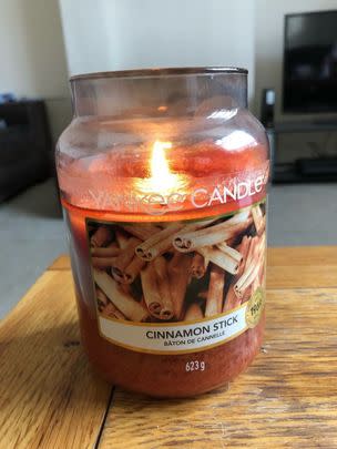 The seasonal cinnamon scent of this Yankee Candle is *incredible* – and it burns for absolutely ages too.