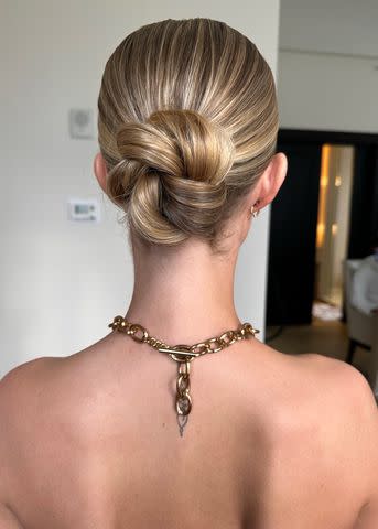 <p>Mia Santiago</p> An intricate bun, styled by Mia Santiago