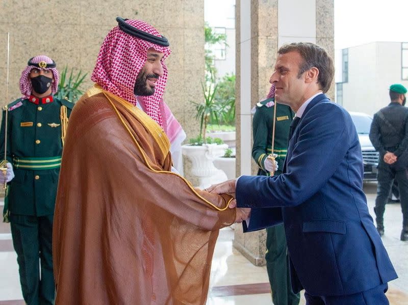 FILE PHOTO: Saudi Crown Prince, Mohammed bin Salman receives French President Emmanuel Macron in Jeddah, Saudi Arabia