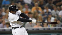 Detroit Tigers' Jonathan Schoop hits a solo home run against the Boston Red Sox in the seventh inning of a baseball game in Detroit, Wednesday, Aug. 4, 2021. (AP Photo/Paul Sancya)