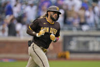 San Diego Padres' Fernando Tatis Jr. reacts after hitting a grand slam during the seventh inning of a baseball game against the New York Mets at Citi Field, Sunday, June 13, 2021, in New York. (AP Photo/Seth Wenig)