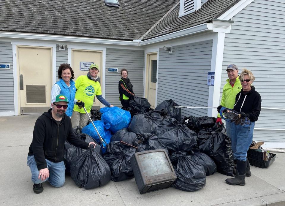 The newly formed Keep Barnstable Beautiful chapter held a cleanup event on Nov. 4, collecting 65 trash bags full of litter. Pictured with some of the bags are, from left, John Pomeroy, Beth Couet, Andrea Pendergast, Sarah Kennedy, Bill Couet and Poppy Kennedy. They plan to lead cleanup efforts at least twice annually, in addition to beautification projects in the town.