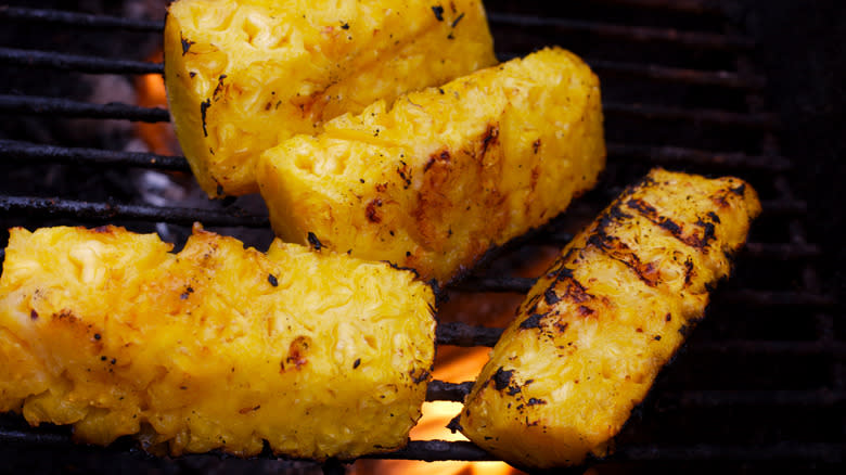 Grilled pineapple over fire