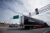 A truck heads towards the United States at the Lacolle border crossing in Lacolle, Quebec, Canada April 26, 2017. REUTERS/Christinne Muschi