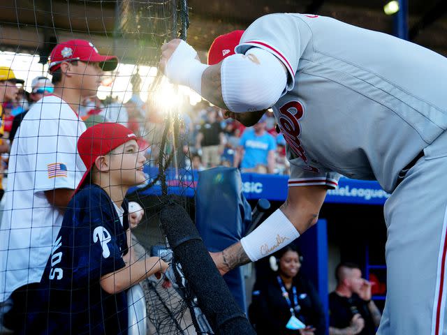 <p>Mary DeCicco/MLB Photos/Getty</p> Nick Castellanos with his son, Liam, prior to the 2023 Little League Classic.