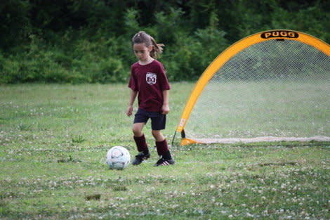 My daugheter playing soccer.