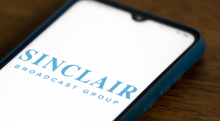 n this photo illustration the Sinclair Broadcast Group (SGBI) logo seen displayed on a smartphone