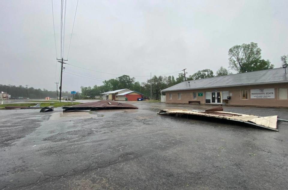 Debris from portable buildings at Gulf Coast Portable Buildings are strewn about near the Mississippi State Extension Service Office in Kiln after a possible tornado hit the area on Wednesday, April 10, 2024.