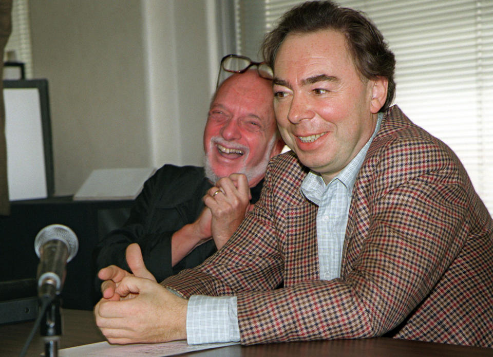 FILE - This Oct. 21, 1996 file photo shows Harold Prince, left, and Andrew Lloyd Webber, face reporters during a news conference in New York announcing Webber's new musical, "Whistle Down The Wind." Prince, who pushed the boundaries of musical theater with such groundbreaking shows as “The Phantom of the Oepra,” "Cabaret," "Company" and "Sweeney Todd" and won a staggering 21 Tony Awards, died Wednesday, July 31, 2019, after a brief illness in Reykjavik, Iceland. He was 91. (AP Photo/Anders Krusberg, File)