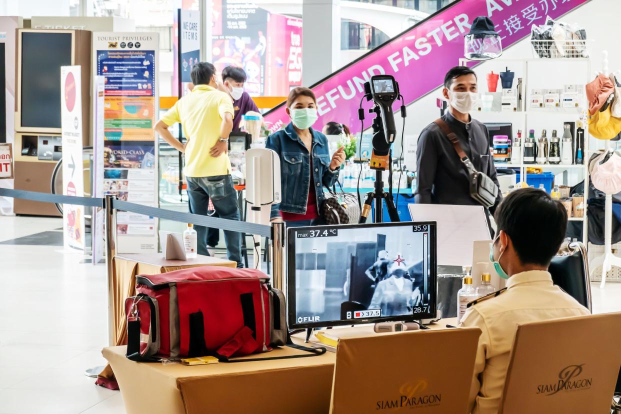 Bangkok,Thailand - April 07 2020. Temperature control zone, monitor of thermal scanner camera to check people entrance of Siam paragon shopping mall in Bangkok during Coronavirus, Covid 19 outbreak.