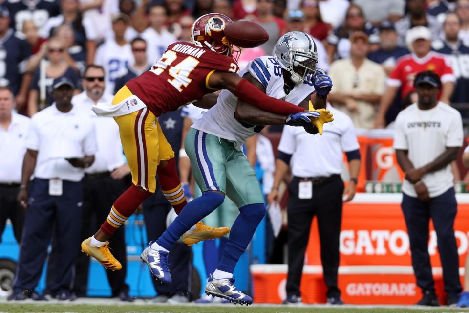 <p>Cornerback Josh Norman #24 of the Washington Redskins breaks up a pass intended for wide receiver Dez Bryant #88 of the Dallas Cowboys in the first quarter at FedExField on September 18, 2016 in Landover, Maryland. (Photo by Patrick Smith/Getty Images) </p>