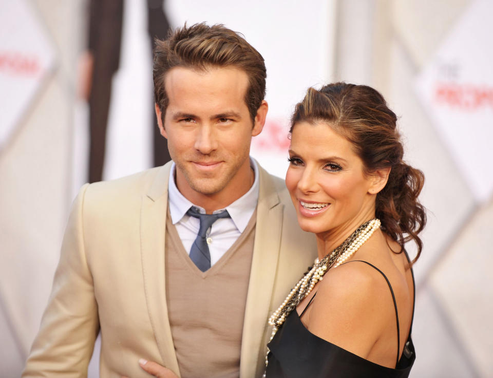 Actor Ryan Reynolds and actress Sandra Bullock arrive at the Los Angeles premiere of 