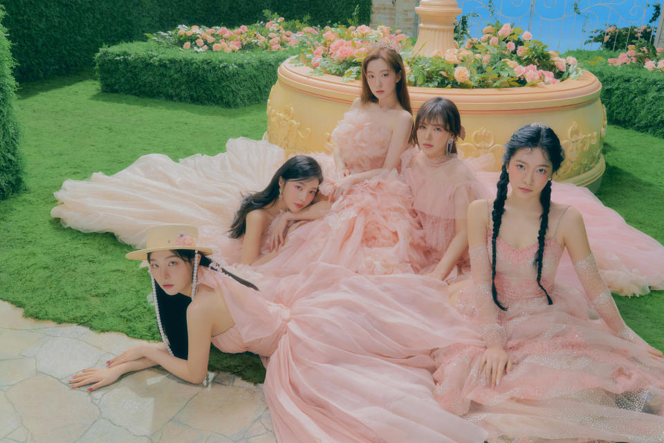 Red Velvet with their huge ball gowns on in Feel My Rhythm. (Photo: SM Entertainment)