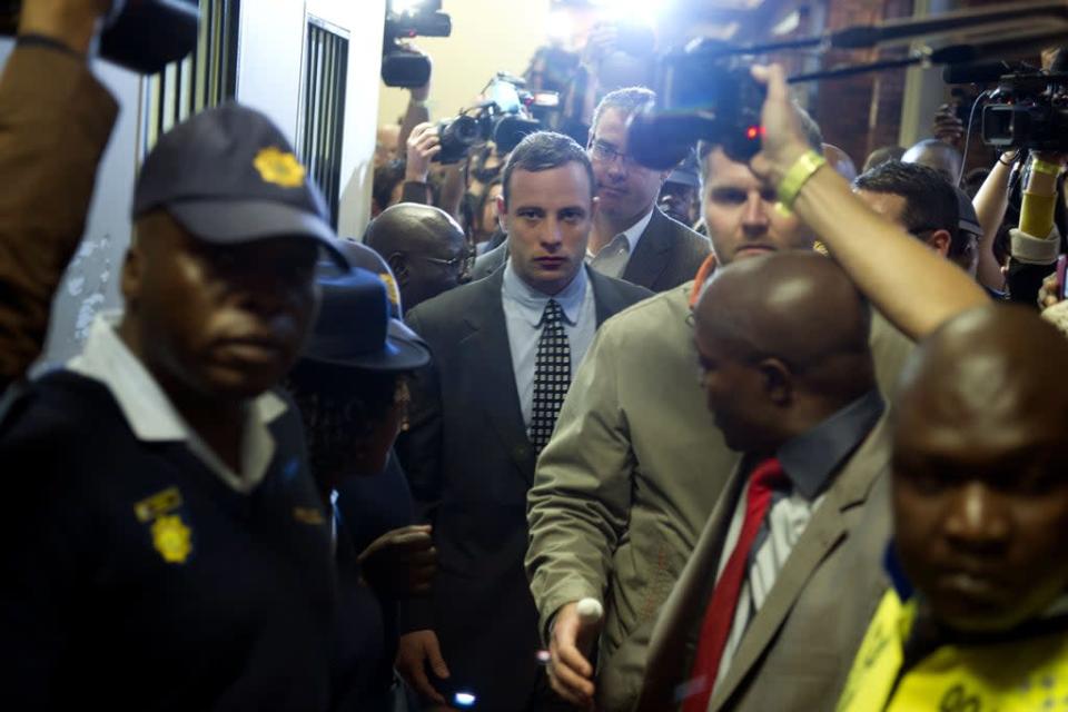 Oscar Pistorius leaving court after a hearing in Pretoria
