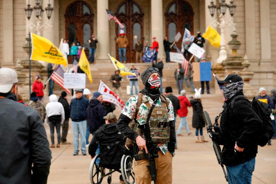 People protest Michigan’s stay-at-home order at the state Capitol in April.