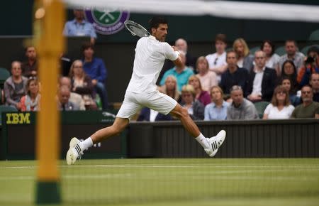 Britain Tennis - Wimbledon - All England Lawn Tennis & Croquet Club, Wimbledon, England - 29/6/16 Serbia's Novak Djokovic in action against France's Adrian Mannarino REUTERS/Tony O'Brien