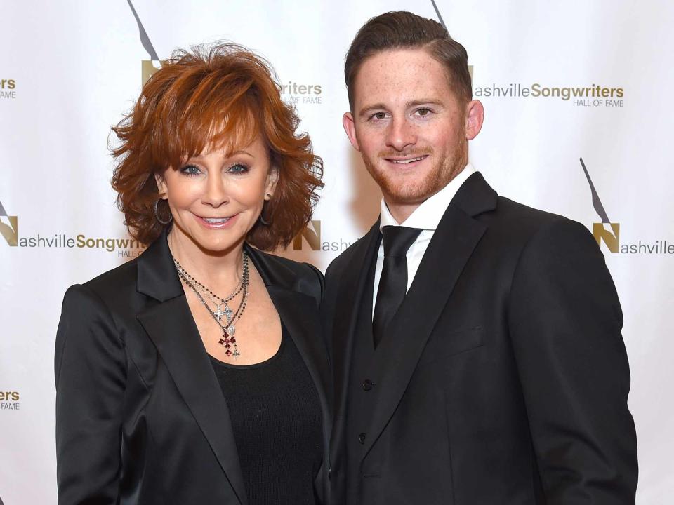 Jason Kempin/Getty Reba McEntire and Shelby Blackstock attend the 2018 Nashville Songwriters Hall Of Fame Gala.