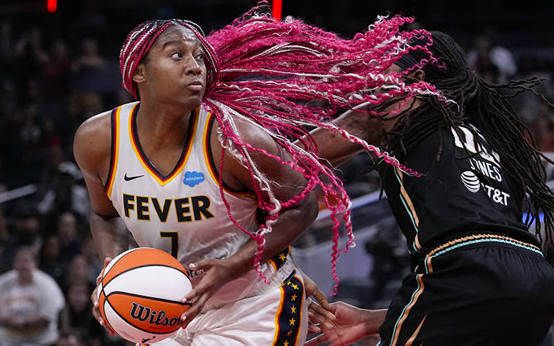 Indiana Fever forward Aliyah Boston looks to shoot over New York Liberty forward Jonquel Jones in the second half of a WNBA basketball game