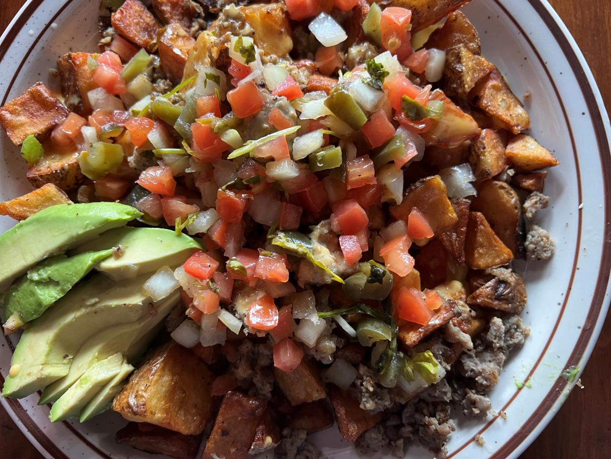 The breakfast nachos Slinger uses a base of home fries at Railroad Bill's Dining Car.