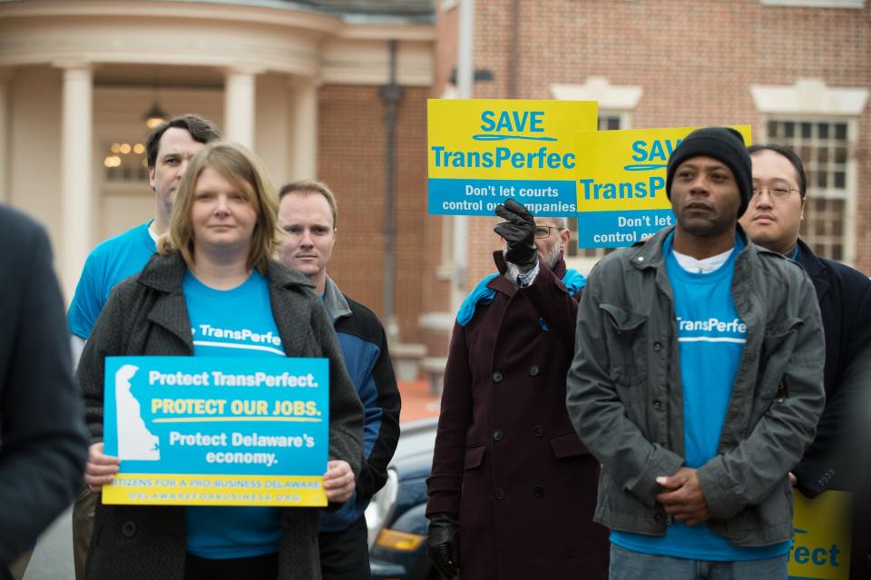 Citizens for a Pro-Business Delaware hold a press conference outside the Delaware Supreme Court in Dover, Del., before oral arguments in the case of Shawe & Elting LLC.