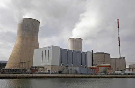 Steam escapes from the cooling tower of the Tihange nuclear power station, one of the two large-scale nuclear power plants in Belgium, March 26, 2016. REUTERS/Vincent Kessler