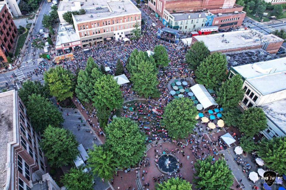 The crowd is shown during Blackfoot's performance during Tuesday night's day of music in downtown Spartanburg. Blackfoot played just before Marshall Tucker Band. City officials estimated the crowd size at 5,500 at its peak Tuesday night.