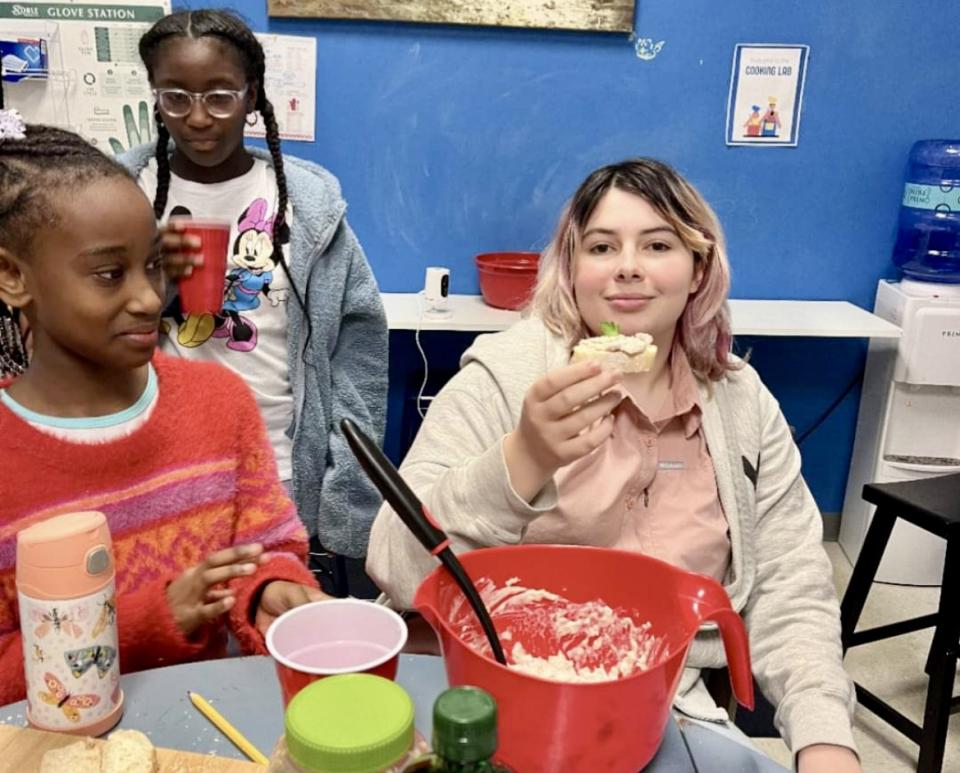 Cora Gorlich, right, attends Sora Academy, which has a kitchen where students cook every week. (Soar Academy)