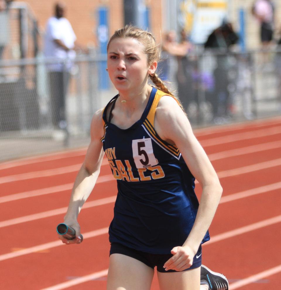 Lancaster's Marisa Heil runs the anchor leg of the 1,600 relay during the Ohio Capital Conference-Buckeye Division championships on Saturday, May 13, 2023. Heil earlier won the 800 with a time of 2:17.55 for the host Golden Gales, who shared the team title with Pickerington Central.