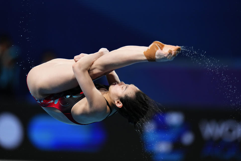 Chang Yani of China competes during the women's 3m springboard diving final at the World Aquatics Championships in Doha, Qatar, Friday, Feb. 9, 2024. (AP Photo/Hassan Ammar)