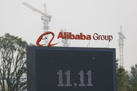 The logo of the Alibaba Group is seen inside the company's headquarters in Hangzhou, Zhejiang province in this November 11, 2014 file photo. REUTERS/Aly Song/Files