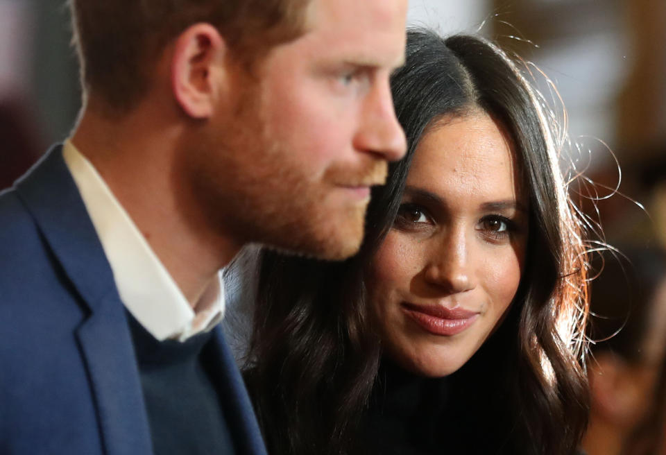 File photo dated 13/02/18 of the Duke and Duchess of Sussex during a reception for young people at the Palace of Holyroodhouse, in Edinburgh. The Duchess of Sussex has returned to Canada as the Queen and other senior royals took decisive action and ordered their teams to find a "workable solution" to Harry and Meghan's future roles.