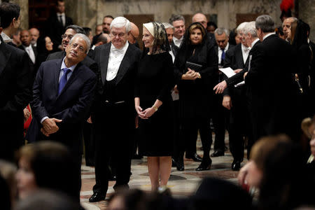 U.S. ambassador to the Holy See Callista Gingrich and her husband (L) wait to meet Pope Francis during the traditional exchange of the New Year greetings in the Regal Room at the Vatican January 8, 2018. REUTERS/Andrew Medichini/Pool