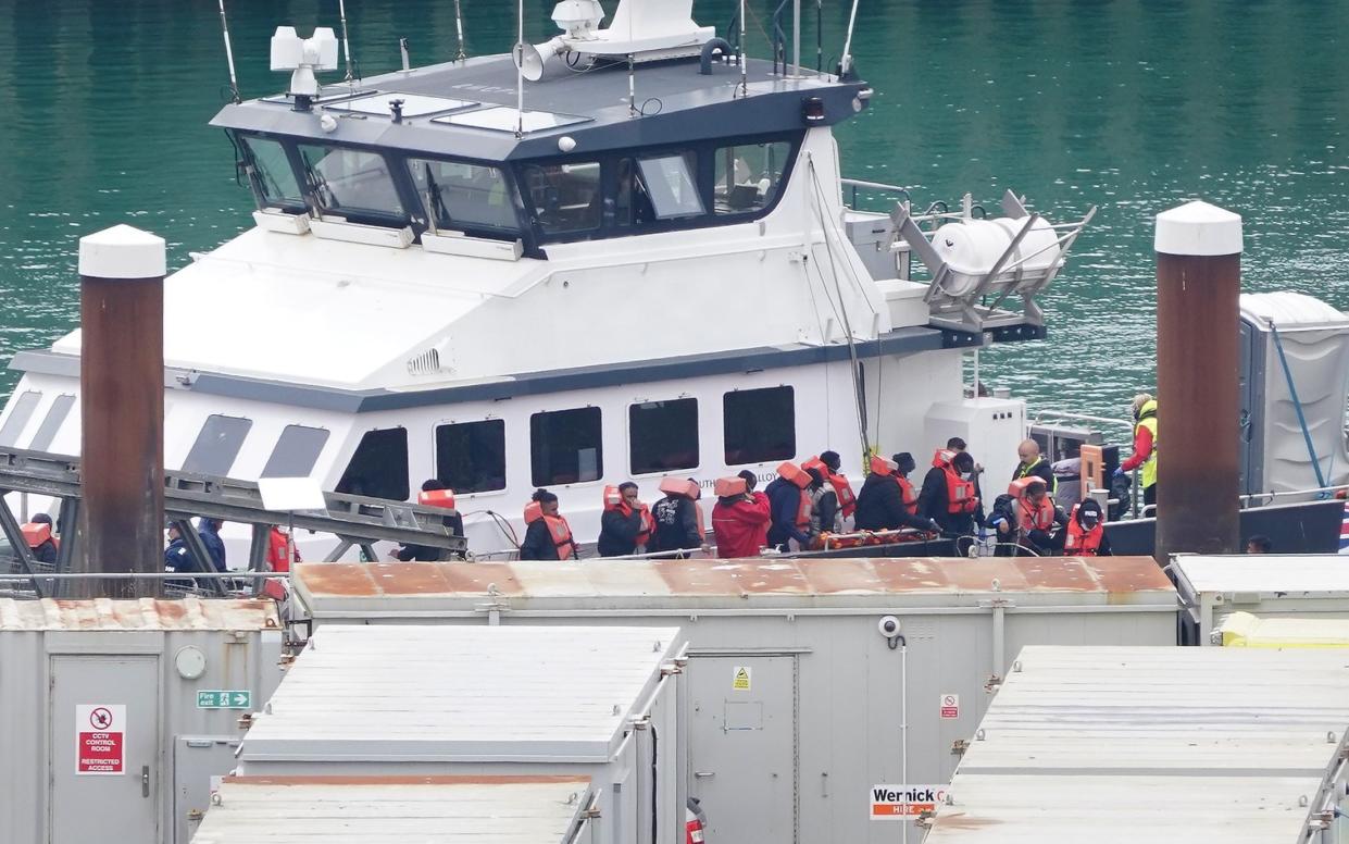 A group of people thought to be migrants are brought in to Dover, Kent, from a Border Force vessel