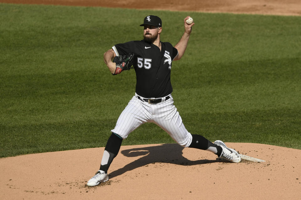 El abridor Carlos Rodón, de los Medias Blancas de Chicago, hace un lanzamiento en el encuentro del jueves 29 de abril de 2021 ante los Tigres de Detroit (AP Foto/Paul Beaty)