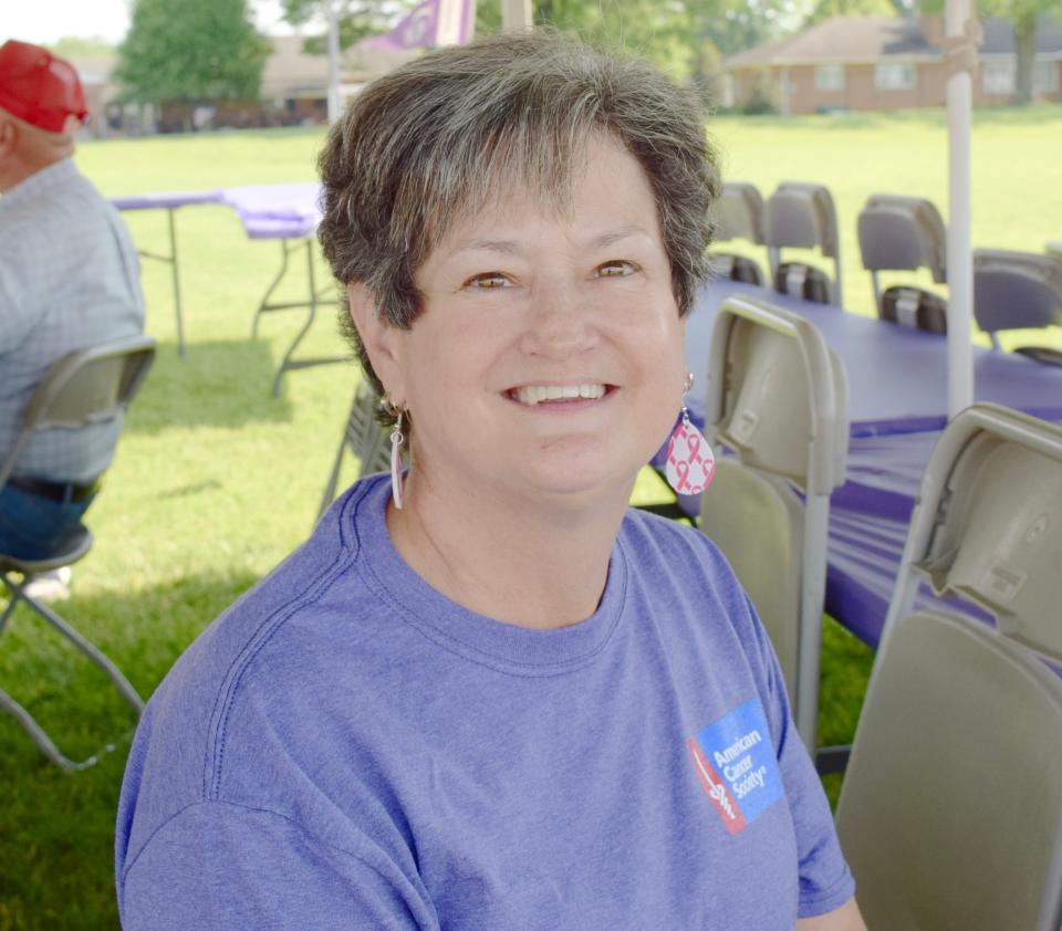 Beth Pryor of Fayetteville, Pa., talks about her own experience with cancer during Saturday's Relay for Life fundraiser in Greencastle, Pa.