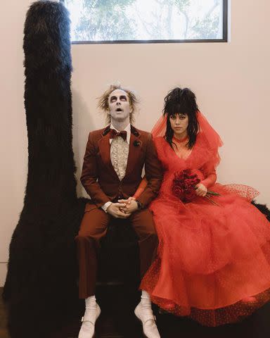 <p>Kourtney Kardashian/Instagram</p> Kourtney Kardashian and Travis Barker dress up in 'Beetlejuice' costumes for Halloween 2023