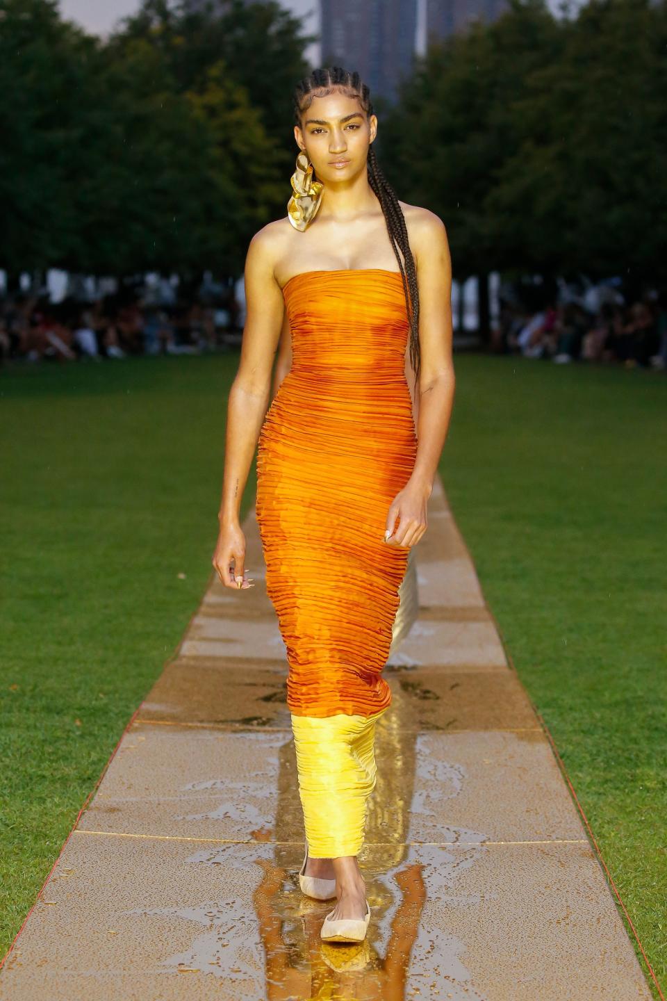 A model walks down the golden runway at Prabal Gurung's spring/summer2024 show at New York Fashion Week on Sept. 8, 2023.