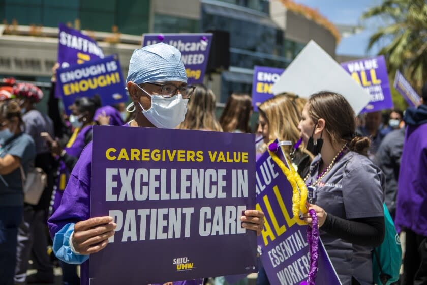 LOS ANGELES, CA - MAY 09: Members of the Service Employees International Union-United Healthcare Workers West started weeklong strike today at Cedars-Sinai Medical Center on Monday, May 9, 2022 in Los Angeles, CA. Workers are alleging safety concerns, short-staffing and low wages at the hospital. Among the workers taking part are nursing assistants, lab technicians, surgical technicians and plant operations workers. (Francine Orr / Los Angeles Times)