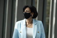 Dr. Rochelle Walensky, director of the U.S. Centers for Disease Control and Prevention, walks during an interview with The Associated Press on Wednesday, Dec. 8, 2021, in Atlanta. More than 40 cases of the omicron variant have been reported in the U.S. so far, with most of them people who were vaccinated and nearly all of them suffering only mild illness, Walensky said Wednesday. ​(AP Photo/Brynn Anderson)